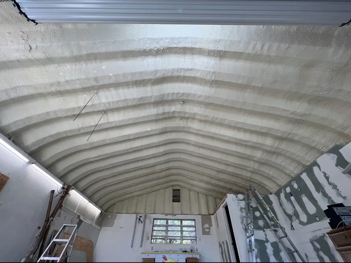 Spray polyurethane foam applied to the underside of a metal roof deck in Elizabethton